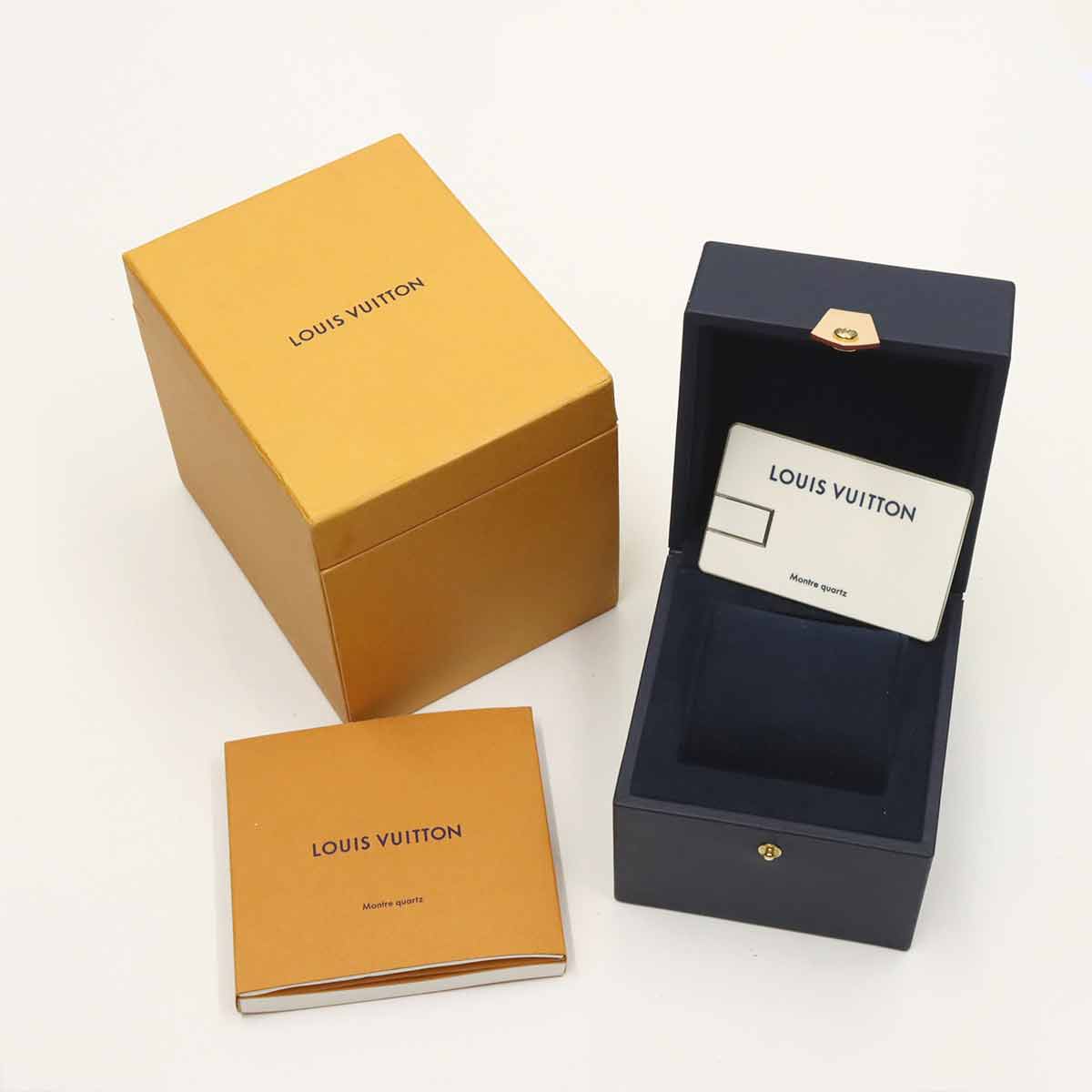 Tambour Slim Rainbow Q113Z Quartz Black Dial Mens