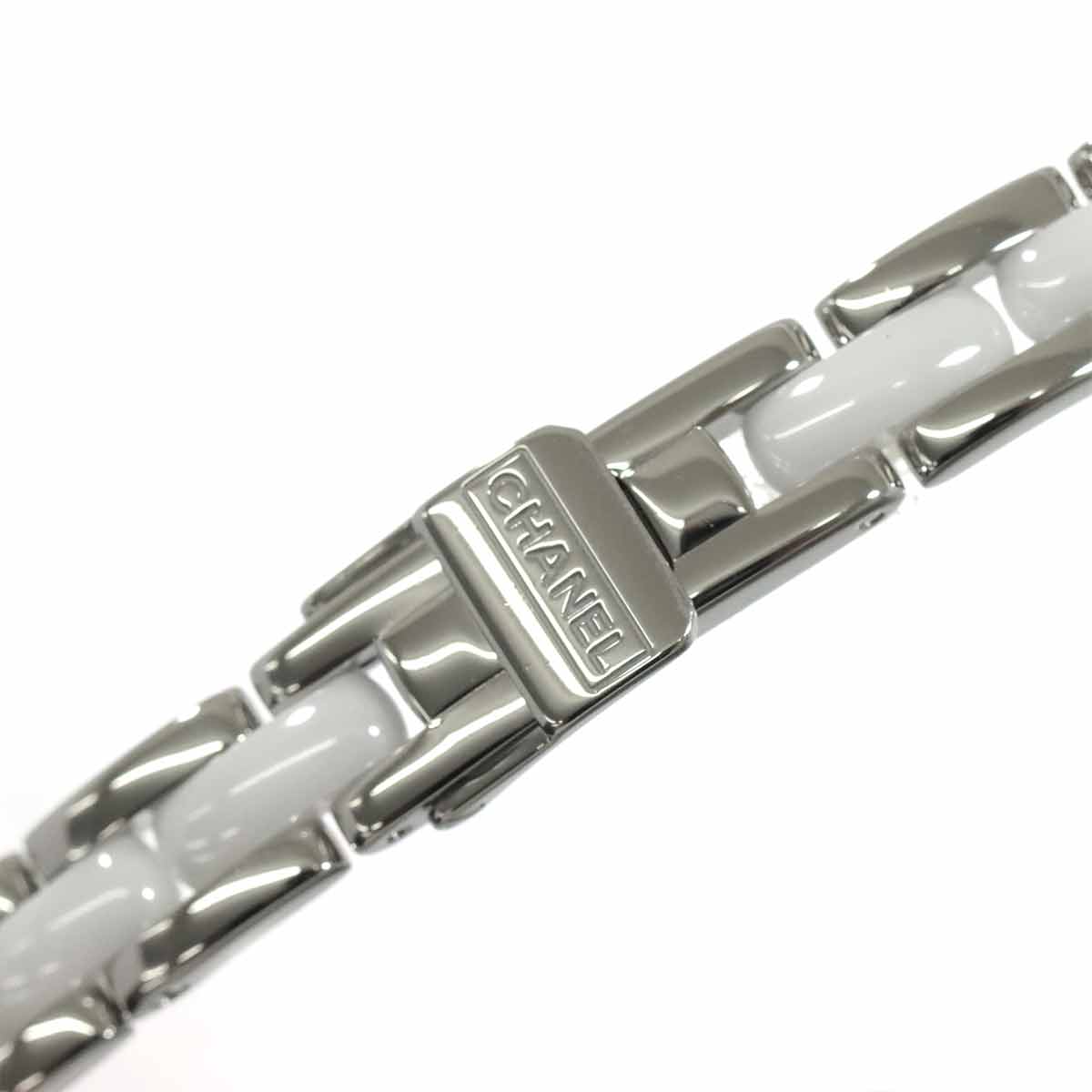 Premiere H3059 Diamond Bezel Ceramic Quartz White Dial Ladies