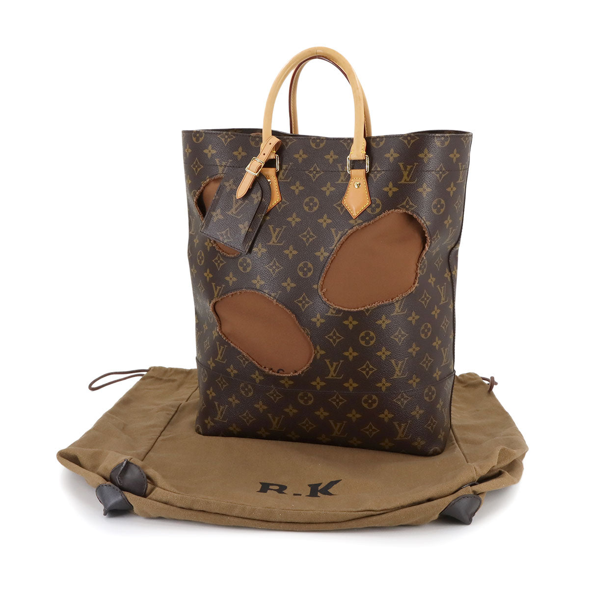 Monogram with Holes Tote Bag Rei Kawakubo Brown M40279
