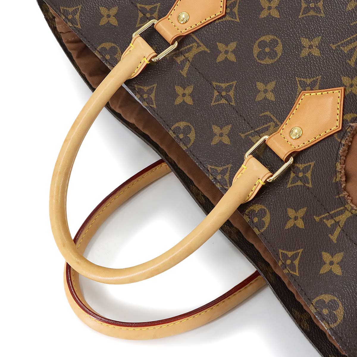 Monogram with Holes Tote Bag Rei Kawakubo Brown M40279