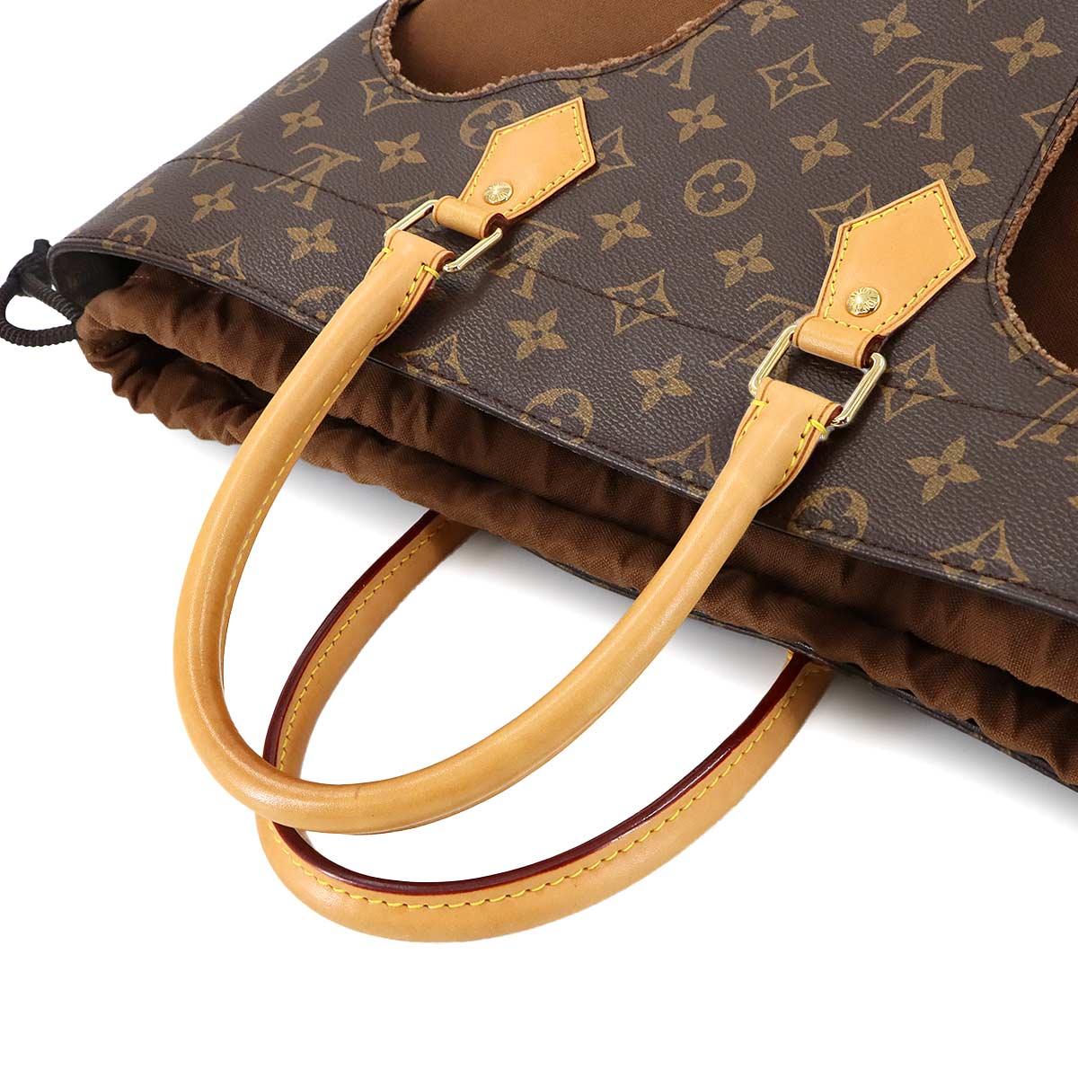 Monogram with Holes Tote Bag Rei Kawakubo Brown M40279