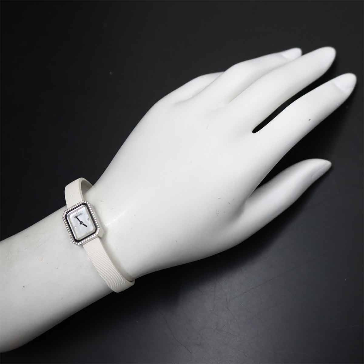 Premiere H2433 Diamond Bezel Rubber White Shell Dial Ladies