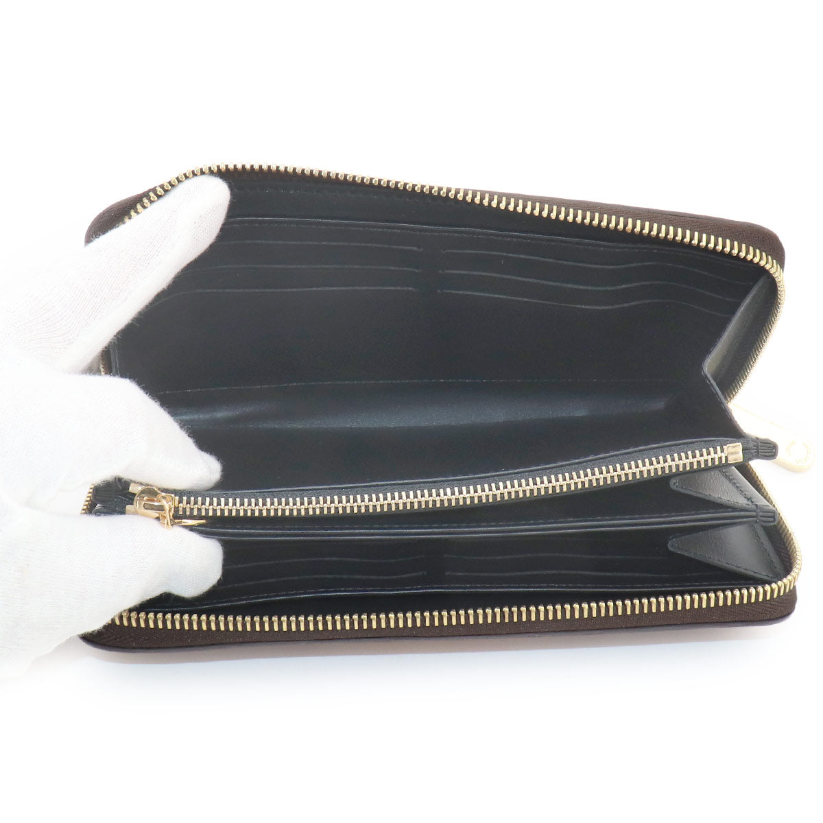 Time Trunk Transformed Monogram Zippy Wallet M52746
