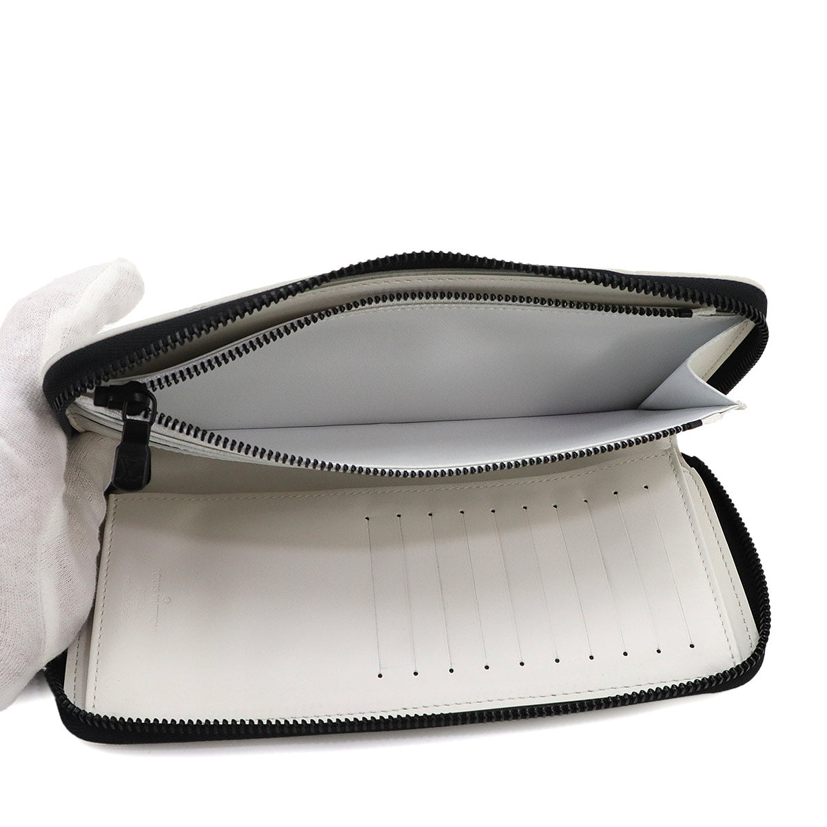 Monogram Shadow Zippy Wallet Vertical White Navy M83381