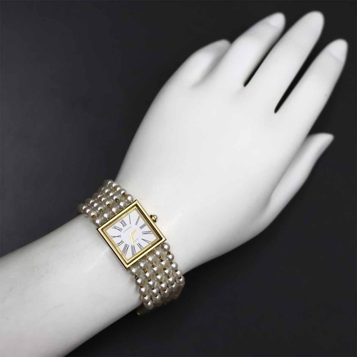 Mademoiselle Pearl Bracelet H0007 750 YG White Dial Ladies
