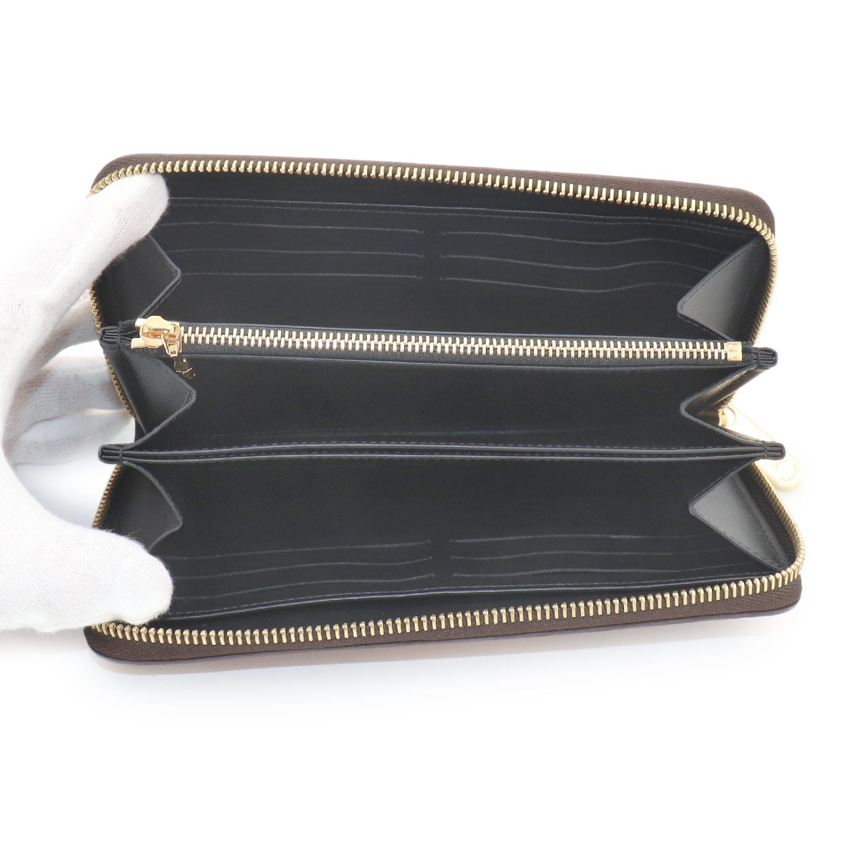 Time Trunk Transformed Monogram Zippy Wallet M52746