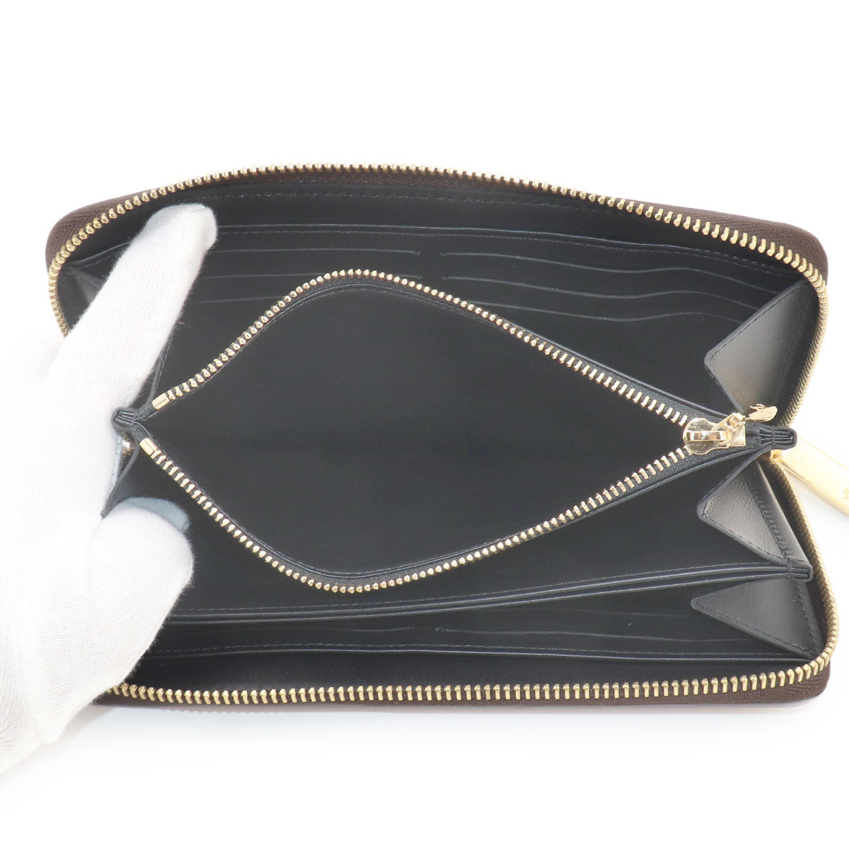 Time Trunk Transformed Monogram Zippy Wallet M52746