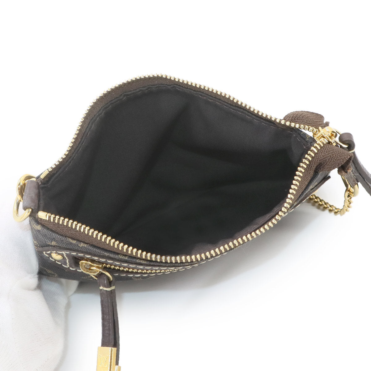 Monogram Mini Lin Pochette Accessoires Ebene M95668