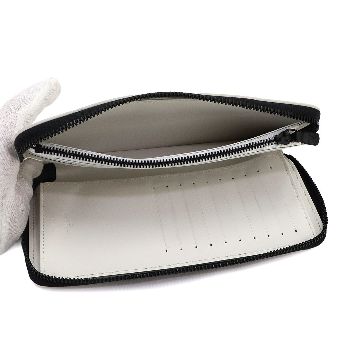 Monogram Shadow Zippy Wallet Vertical White Navy M83381